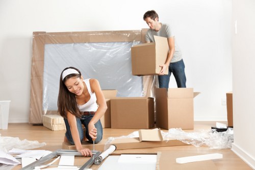 Careful packing materials protecting fragile items during a Camden move