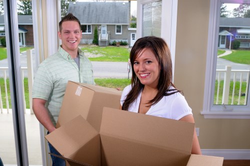 Packed boxes and labelled items ready for a Camden house move
