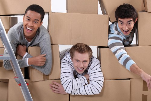 Local moving team handling furniture in Camden