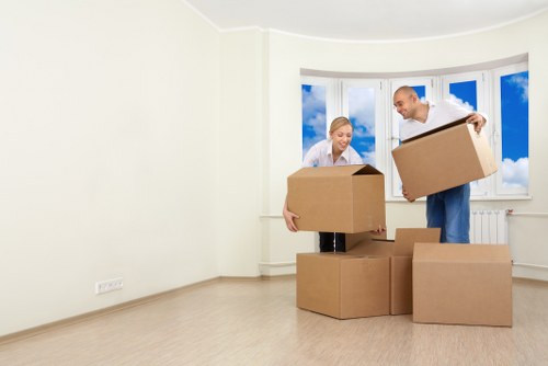 Removal team protecting furniture with safety equipment during a Camden move
