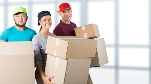 Careful handling of packed household items during a Camden relocation