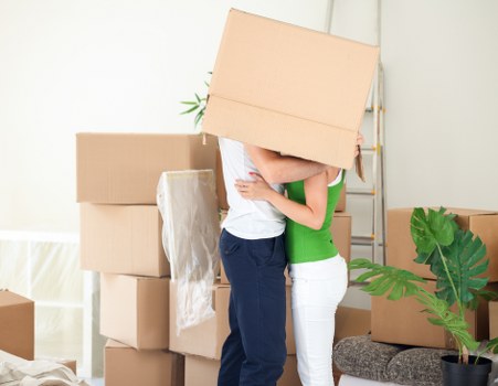 Movers handling business relocation logistics in a Camden street setting
