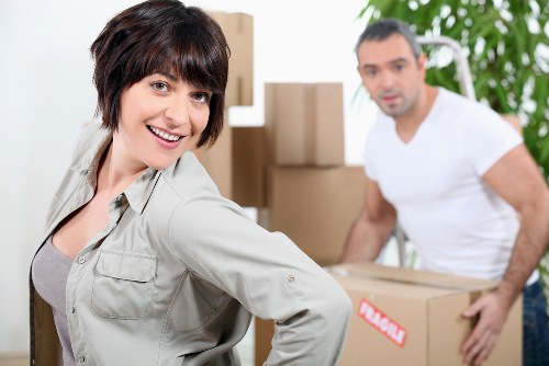 Loading furniture and boxes into a moving truck in Camden