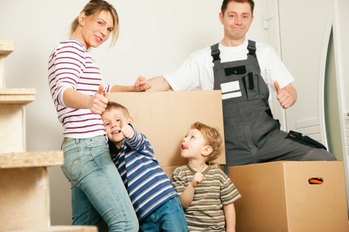 Packed boxes and wrapped furniture ready for a Camden relocation