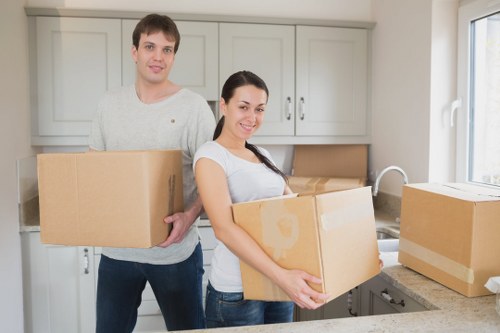 House removal planning with furniture and packing materials